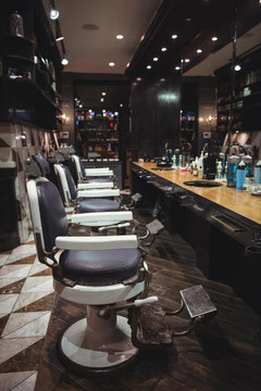Barber chair arranged in a row