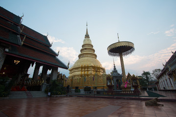 Wat Phra That Hariphunchai(temple)  in lamphun with Monks are praying
