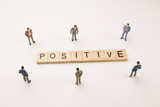 businessman figures meeting on positive word
