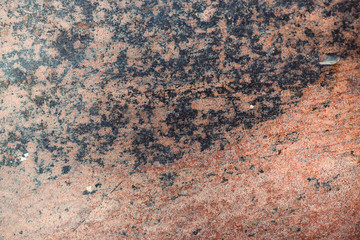 Rusty metal surface is covered with corrosion. Background image of piece of iron. Oxide texture.
