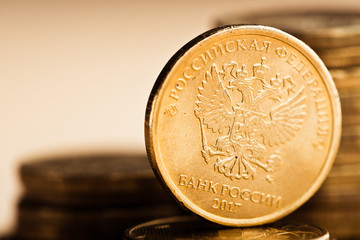 The Russian rouble coin and gold coins