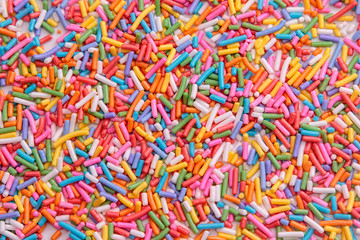 Fototapeta na wymiar Colorful sugar sprinkle background ,decoration for cake and bakery