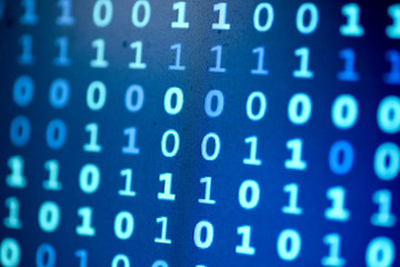 Obraz premium Data bits computer bits blue background of screen monitor.