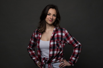 studio portrait of a young beautiful fashionable woman