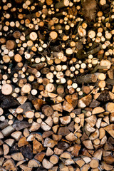 Pile of dry stacked firewood for winter