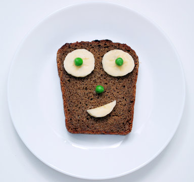 stock-photo-funny-and-cute-face-toast-for-breakfast-or-lunch-food-on-the-white-background