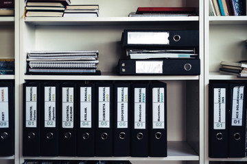 Shelf with documents in office