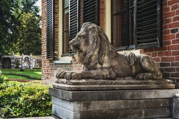 Lion sculpture in front of the castle and park  Rosendael