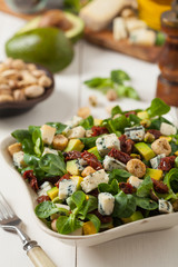 Italian salad with avocado, gorgonzola cheese.