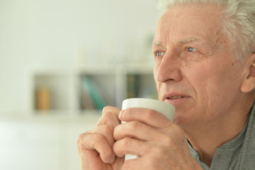 Senior man drinking tea