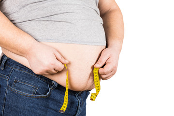Thick mature man measuring belly yellow measuring tape isolated on white background.