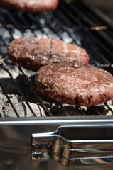 BBQ two Beef steak kebab on fire on picnic
