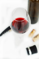 Glass of Red Wine Corkscrew Wine Bottle Corcks Isoalted on White Top view Flat Lay