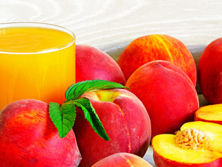 Peach smoothies and fresh ripe peaches