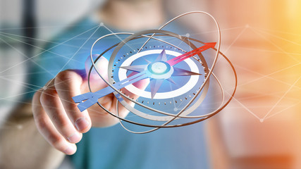 Business man holding a navigation compass - 3d rendered