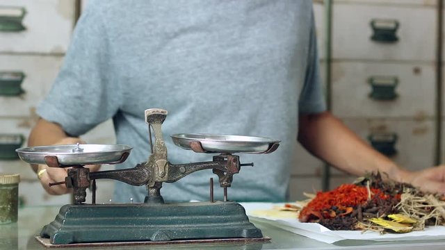 weighting scale herbal in chinese drug store for treatment healthy