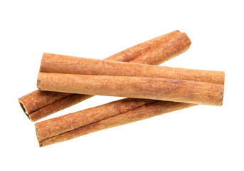 whole cinnamon on white background
