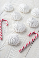 French vanilla meringue cookies close up white christmass background.