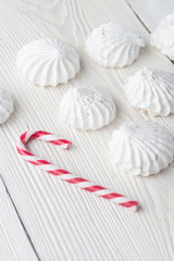 French vanilla meringue cookies close up white christmass background.