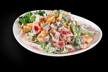 Chicken Salad. Chicken Caesar Salad. Caesar Salad with grilled chicken on plate. Grilled chicken breasts and fresh salad in plate