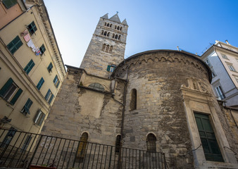 Fototapeta na wymiar GENOA, ITALY, APRIL 5, 2018 - The apse and the bell tower of the Convent of San Giovanni di Prè (La Commenda) inside the historic centre of city of Genoa, Italy.