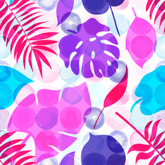 Seamless pattern of tropical leaves on the watercolor dotted bac