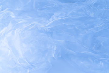 Obraz premium Transparent fabric background in blue color