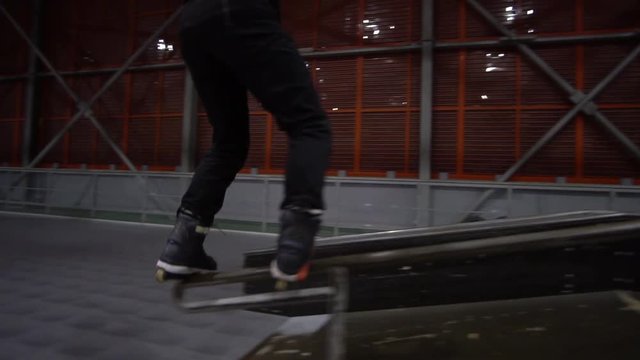 A man shows a Royal trick in a skate park