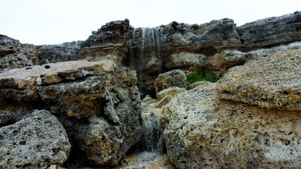 Fototapeta na wymiar Rain water created a new waterfall