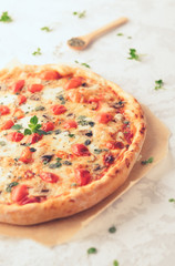Margherita home made pizza with mushrooms on white table