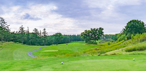 Panorama view of Golf Course where the turf is beautiful and green in Hokkaido, Japan. Golf course with a rich green turf beautiful scenery.