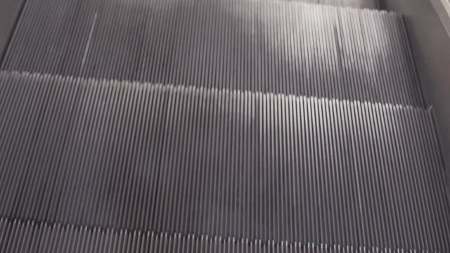 close up of escalator steps on running escalator