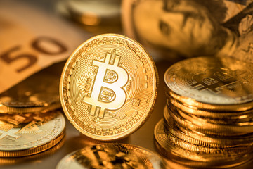 Shiny physical bitcoins. Blockchain technology.