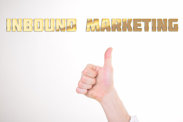 A businessman shows an inscription:INBOUND MARKETING