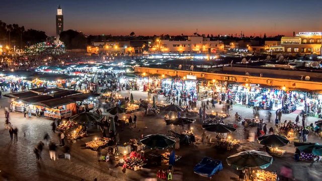 Jemaa el-Fnaa (Jamaa el Fna) square and market place in Marrakesh's medina quarter (old city), Morocco. Time lapse after sunset.  
