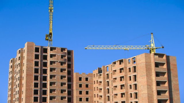 Building big living house from scratch, real image on blue sky background. Original color and design completely changed, timelapse
