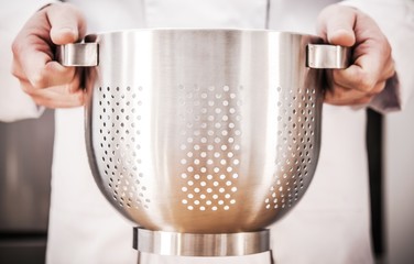 Chef with Colander in Hands