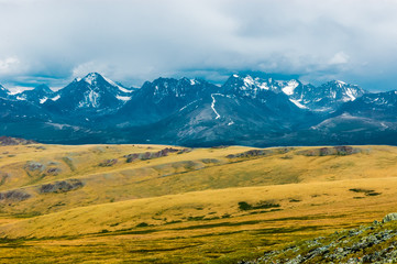 Fototapeta premium Mountain landscape with clouds. Mountain valley. The Altai mountains. Travel adventure vacation background