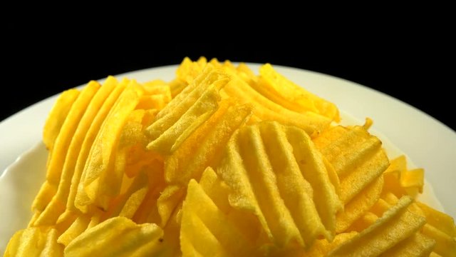 Tasty Chips rotate on a plate