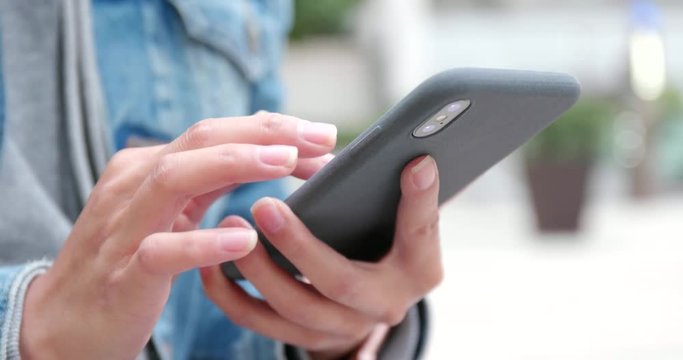 Close up of woman use of mobile phone