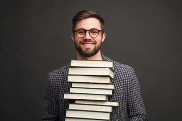 Diligent man with books