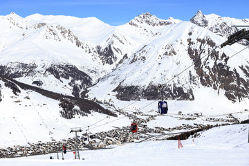 Fototapeta na wymiar Livigno in Alta Valtellina, Italian Alps in Winter.