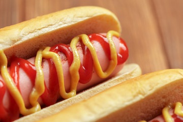 Hot dogs on wooden background