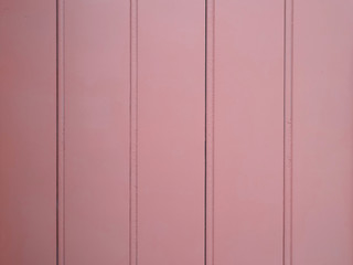 Background of pink wooden sheets.