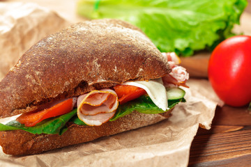 sandwich on a wooden table