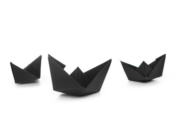 Naklejka premium paper ships isolated on white