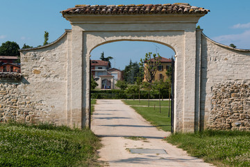 Fototapeta na wymiar External Entrance and Footpath of Historical Green Park Farnesiano in Sala Baganza Parma, Italy