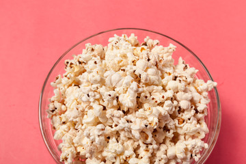 popcorn on color background