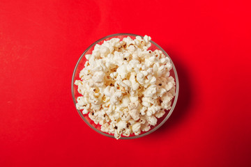 popcorn on color background