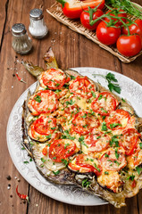 Grilled fish with vegetables and cheese